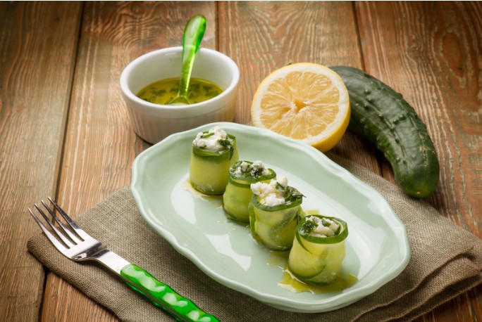 Rolled up cucumber with feta cheese filling