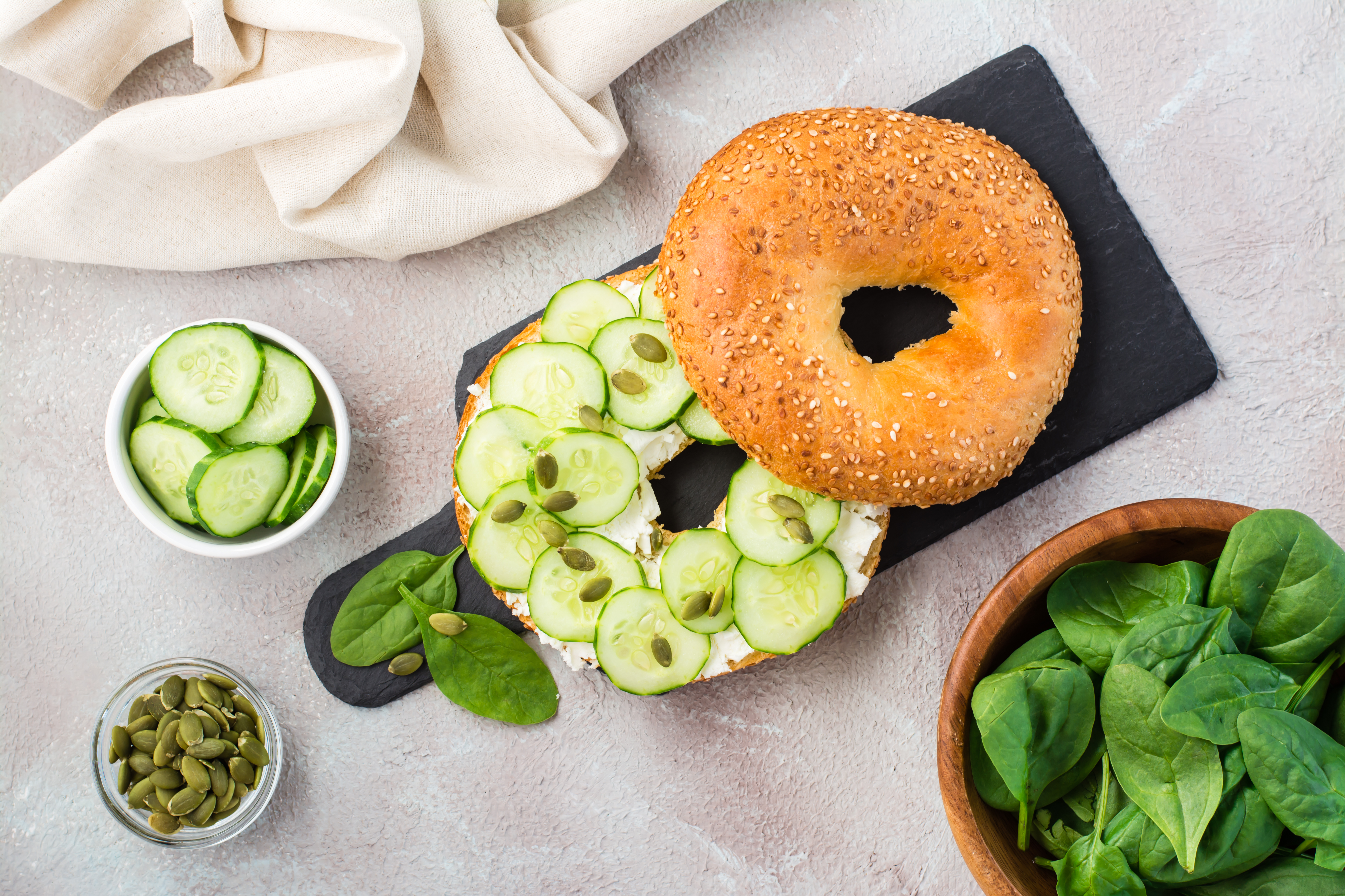 creamy chicken and cucumber bagel